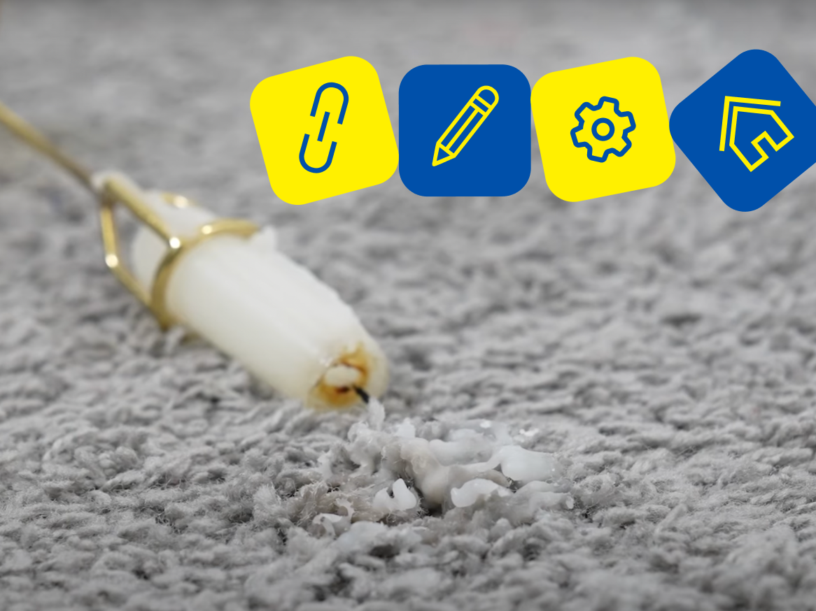 Vela derretida em um tapete cinza com ícones de link, edição, configurações e casa.