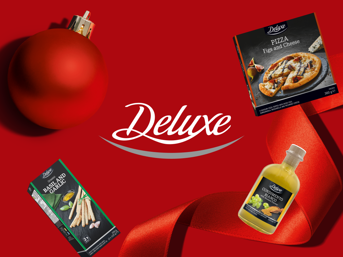 Produtos Deluxe de Natal: pizza de figos e queijo, grissini de manjericão e alho, e condimento branco.